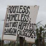 The spirit of the people in the Philippines; sign reading "Roofless, homeless but not hopeless". 
